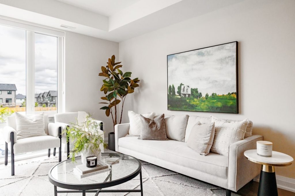 modern-living-room-with-white-sofa-and-artwork-5h-lubdilto